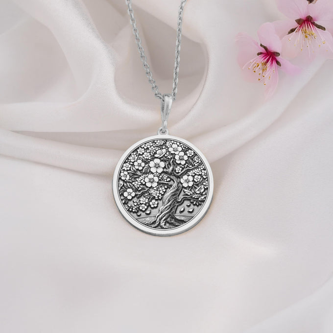 925 Sterling Silver Sakura Tree Pendant showcasing a delicate cherry blossom design, perfect for nature enthusiasts and timeless jewelry collectors.
