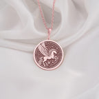 Rose Gold Plated Pegasus Necklace showcasing a beautiful winged horse medallion inspired by Greek mythology.Perfect for those who appreciate unique mythology-themed designs and makes a wonderful gift for special occasions.