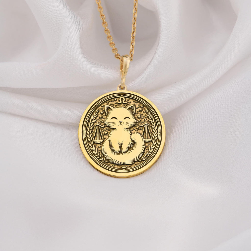 Libra Scales Zodiac Pendant Necklaces 14K 14K Gold Plated pendant necklace featuring a cat between scales design.