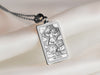 The Fool tarot card charm silver necklace featuring , an etched charm perfect for a personalized necklace. and ideal for everyday wear, this vintage inspired pendant is a unique protection amulet for those embracing hope and new journeys