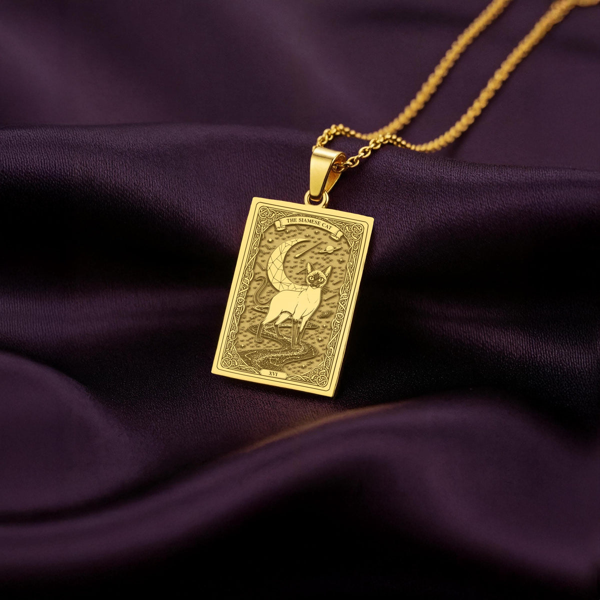 A polished 14K solid gold Siamese Cat medallion. This fine pet jewelry represents the breed's intelligent spirit, making it a perfect cat lover gift.