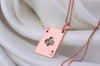 Queen of Club solitaire gold necklace playing card. club symbols and the iconic &quot;Q&quot; in the top left and bottom right corners. the Queen of Clubs, a symbol often linked to intuition, creativity, and power in the world of playing cards.