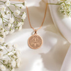 A custom rose gold plated Zodiac coin. This piece is a perfect May birthday gift, celebrating the loyal energy of Taurus.