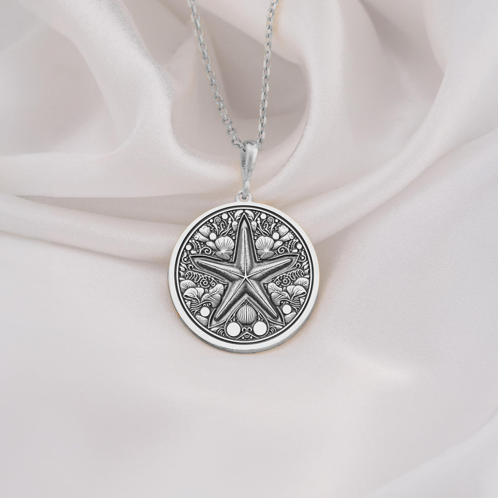 Sterling silver starfish necklace with ocean-inspired design. A dainty beach pendant, perfect as a thoughtful gift for women who love nature and minimalist jewelry. Elegant and timeless, crafted from high-quality sterling silver for durability.