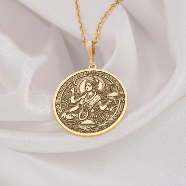 solid gold Annapurna Devi necklace inspired by the Indian goddess of nourishment. This handcrafted pendant symbolizes abundance, spirituality, and grace, making it a perfect gift for astrology lovers, spiritual seekers, or anyone appreciating jewelry