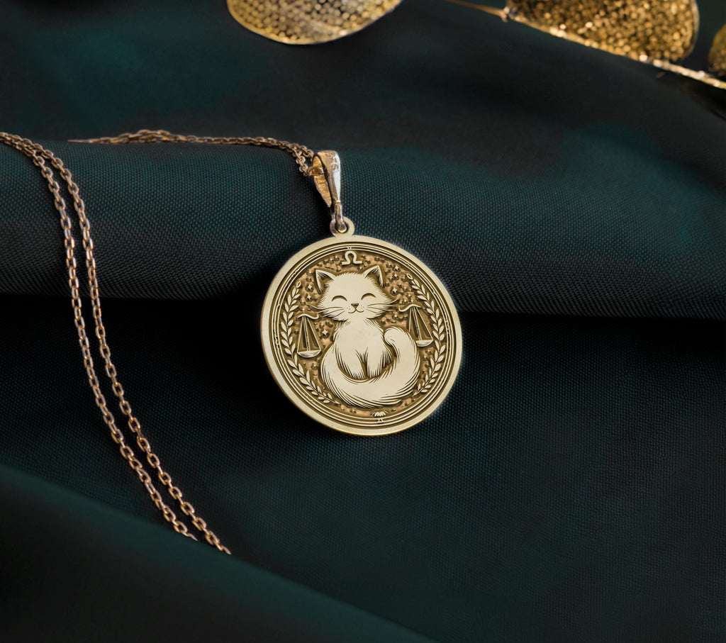 Libra Scales Zodiac Pendant Necklaces 14K 14K Gold Plated pendant necklace featuring an ornate cat face design on a round disc.