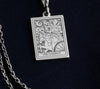 The Silver Chariot Necklace is a beautifully crafted piece made from 925K sterling silver, featuring a detailed tarot charm design. Perfect for tarot enthusiasts, spiritual seekers, or anyone looking for a unique gift, this necklace combines elegance and meaning. It comes with a spring ring clasp, ensuring durability and a luxurious finish. Embrace the energy of The Chariot tarot card with this meaningful jewelry piece, ideal for daily wear or special occasions.