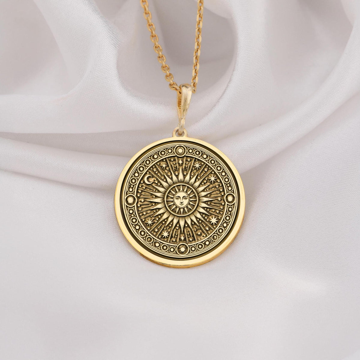 14K solid gold sun pendant necklace featuring a celestial sunburst design, perfect for astrology lovers and boho jewelry enthusiasts.