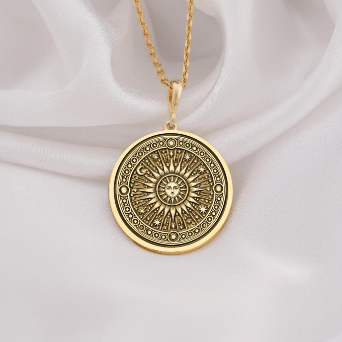 14K solid gold sun pendant necklace featuring a celestial sunburst design, perfect for astrology lovers and boho jewelry enthusiasts.
