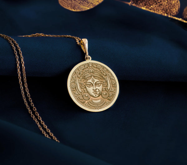 Gold Durga pendant necklace, Shakti charm, Kali amulet, Parvati-inspired, Hindu goddess jewelry, boho layering, spiritual feminine symbol, handcrafted, unique gift, lightweight, resilience charm, versatile, daily wear.