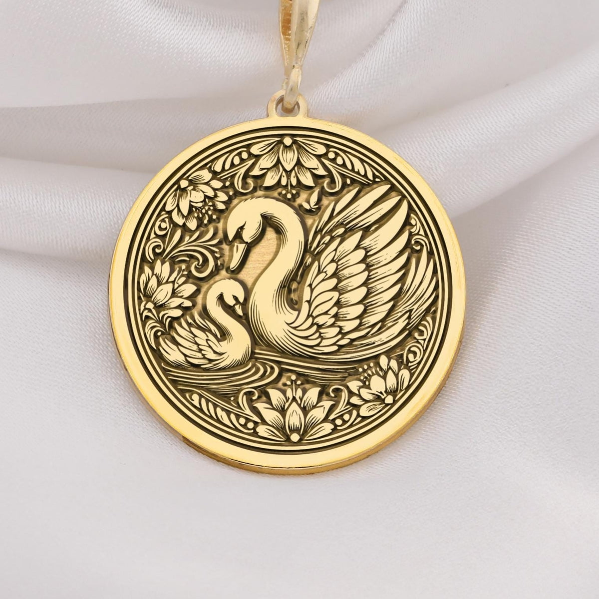 14K Solid Gold Mother Baby Swan Medallion featuring protective mother swan with baby cygnet surrounded by ornate decorative elements. Detailed maternal talisman with family bond symbolism. Luxury swan family jewelry representing unconditional love.