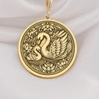 14K Solid Gold Mother Baby Swan Medallion featuring protective mother swan with baby cygnet surrounded by ornate decorative elements. Detailed maternal talisman with family bond symbolism. Luxury swan family jewelry representing unconditional love.