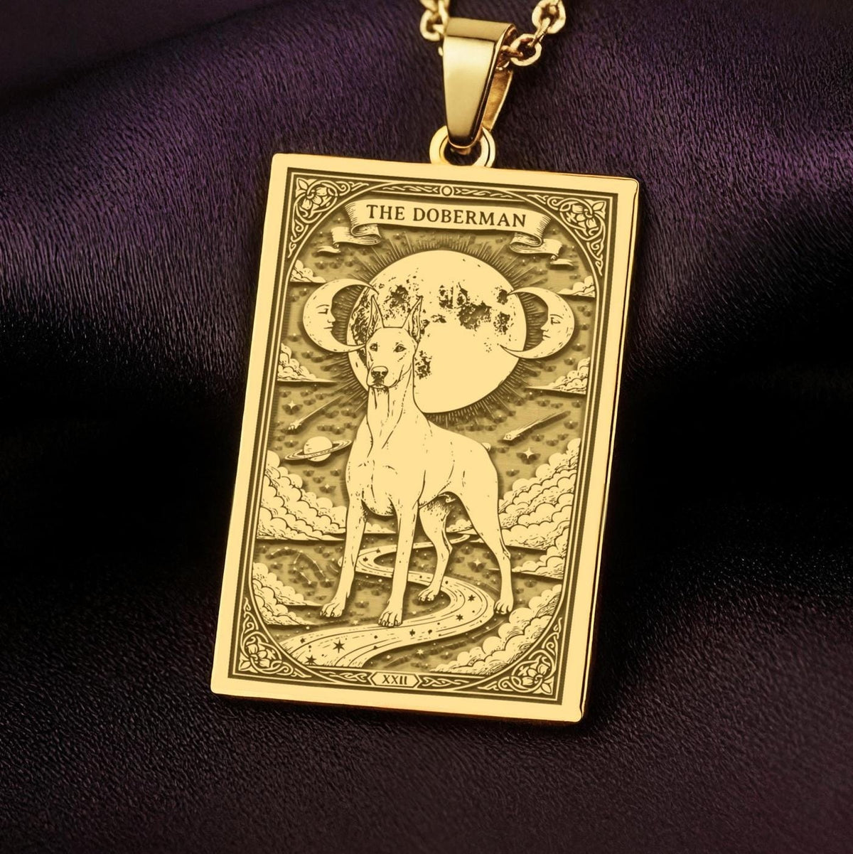 An heirloom-quality 14K solid gold Doberman tarot pendant. The art shows the elegant dog under the moon, symbolizing a loyal guardian, a precious dog mom gift.