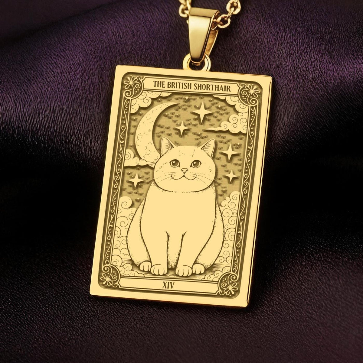 An heirloom-quality 14K solid gold British Shorthair tarot pendant. The art shows the plush cat, symbolizing calm, a precious cat mom gift.