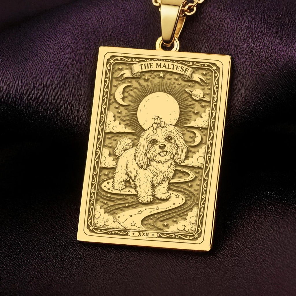 An heirloom-quality 14K solid gold Maltese tarot pendant. The art shows the fluffy dog in a "Sun" card, symbolizing a sunny personality, a precious dog mom gift.