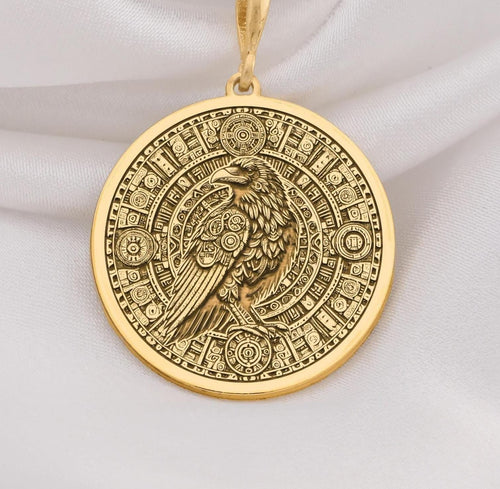 14K Gold Raven Pendant Necklace with intricate Aztec calendar design, perfect for mythology lovers. Ideal gift for anniversaries, birthdays, or special occasions. A timeless gold piece blending cultural symbolism and style.