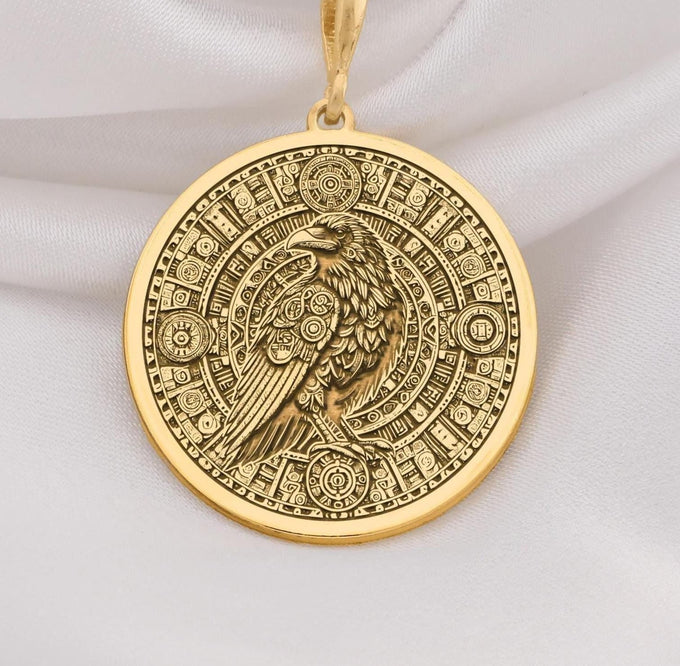 14K Gold Raven Pendant Necklace with intricate Aztec calendar design, perfect for mythology lovers. Ideal gift for anniversaries, birthdays, or special occasions. A timeless gold piece blending cultural symbolism and style.