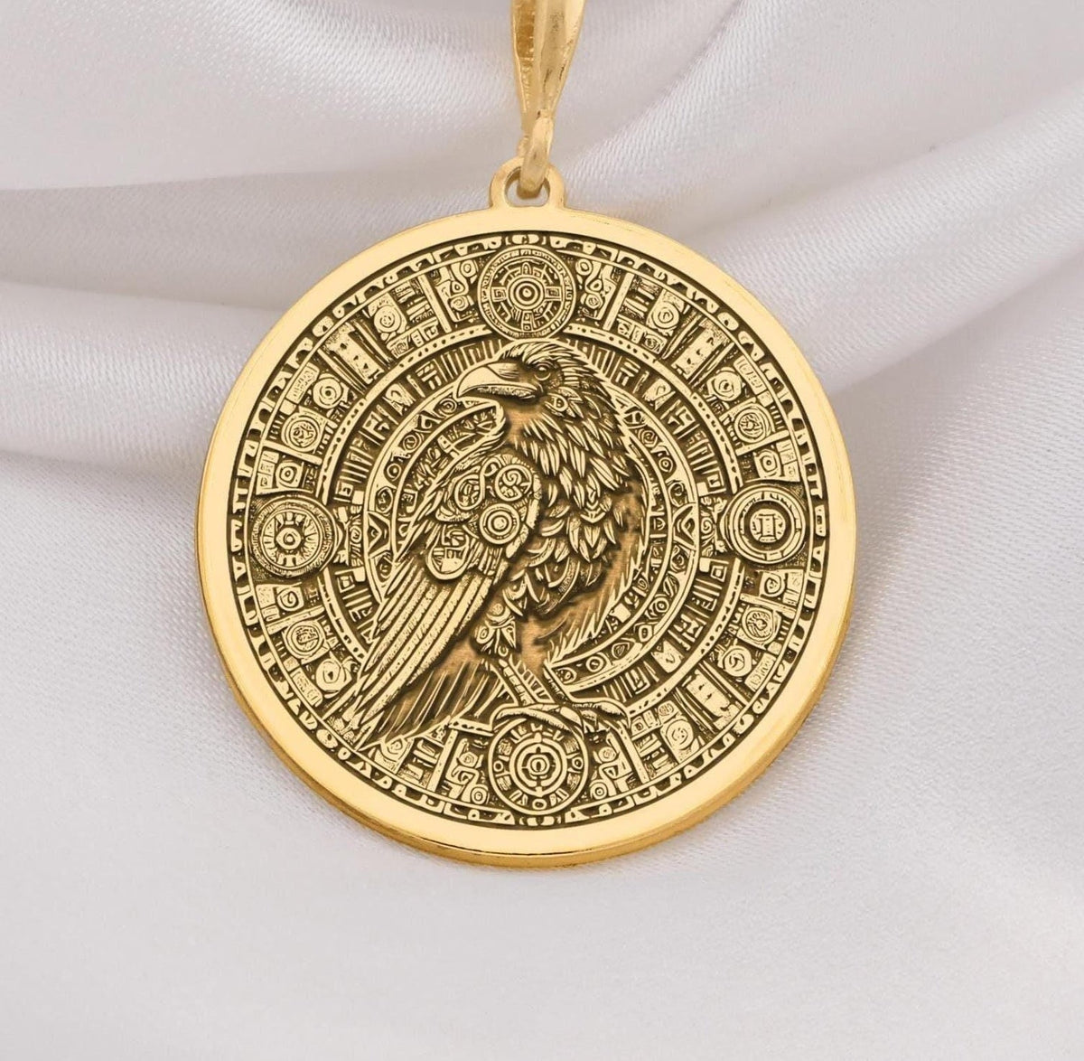 14K Gold Raven Pendant Necklace with intricate Aztec calendar design, perfect for mythology lovers. Ideal gift for anniversaries, birthdays, or special occasions. A timeless gold piece blending cultural symbolism and style.