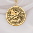14K Solid Gold Panacea Medallion featuring Greek healing goddess with herbs and celestial symbols. Ancient medicine coin with intricate floral border and flowing hair design. Luxury wellness jewelry gift symbolizing divine and healing.