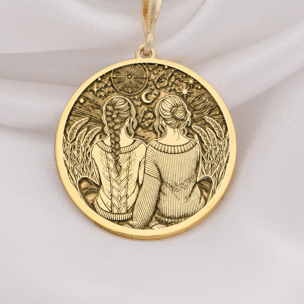 Friendship Friendship Necklace Necklaces 14K 14K Gold Plated pendant necklace featuring two figures with foliage and a crescent moon design.