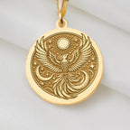 Firebird Mythical Phoenix Pendant Necklaces 14K 14K Gold Plated round pendant featuring an eagle surrounded by celestial stars and crescent moon patterns