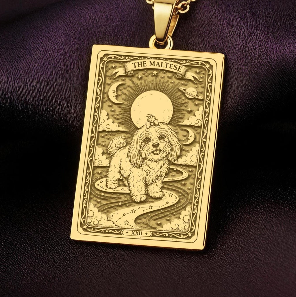 An heirloom-quality 14K solid gold Maltese tarot pendant. The art shows the fluffy dog in a "Sun" card, symbolizing a sunny personality, a precious dog mom gift.