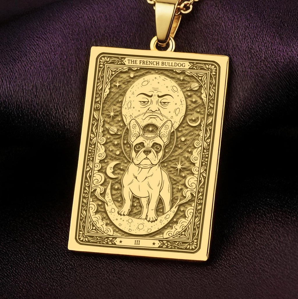An heirloom-quality 14K solid gold French Bulldog tarot pendant. The art shows the Frenchie under a moon-face, symbolizing its comical spirit, a precious dog mom gift.
