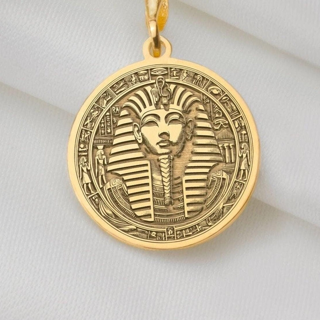 Yellow gold Tutankhamun coin pendant necklace, inspired by ancient Egypt. This dainty 14k gold charm symbolizes royalty and resilience, perfect for layering or daily wear. A unique, lightweight gift blending timeless elegance and boho style.