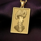 Product photo of a 14K Solid Gold Doberman necklace from the 'Victorian Pet Collection'. The engraved officer portrait is centered clearly on a rich purple satin background.