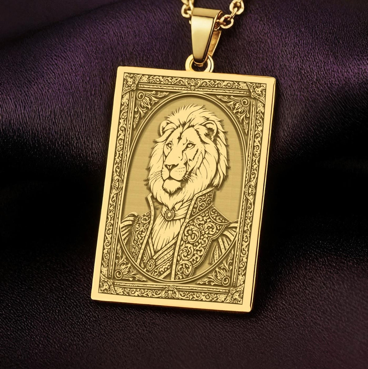 A handmade 14K gold plated rectangular necklace with a highly detailed engraving of a regal lion man. The anthropomorphic art shows a fable character, the King of Beasts, in ornate attire.