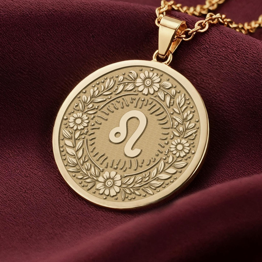 Leo Zodiac Astrological Sign Medallion Necklaces 14K 14K Gold Plated pendant necklace featuring an ornate circular design with floral engravings and a stylized infinity loop.
