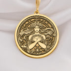 Harmonia Goddess Medallion Necklaces 14K 14K Gold Plated round pendant featuring a woman in a floral wreath design.