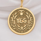 14K Solid Gold YES Medallion featuring powerful affirmation surrounded by wheat laurels and celestial motifs. Detailed empowerment talisman with sun, moon, bird and botanical symbols.Symbolizing positive decisions and abundant manifestation.