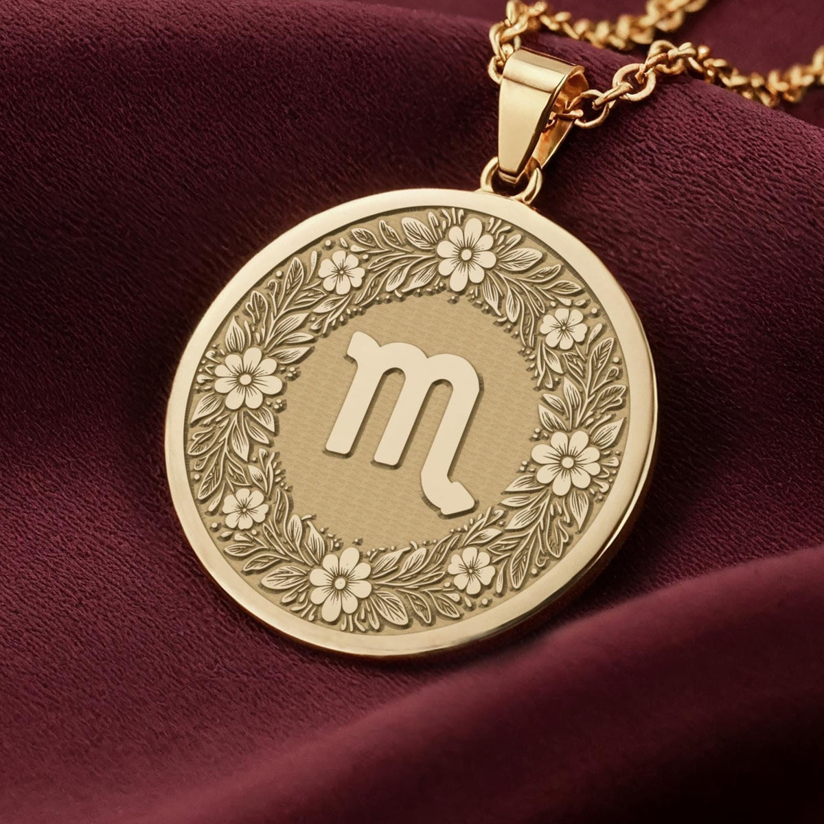 14K Solid Gold Scorpio Zodiac Medallion with Scorpio symbol (♏) and a floral wreath border. A perfect personalized gift with optional back engraving. Detailed celestial horoscope jewelry.