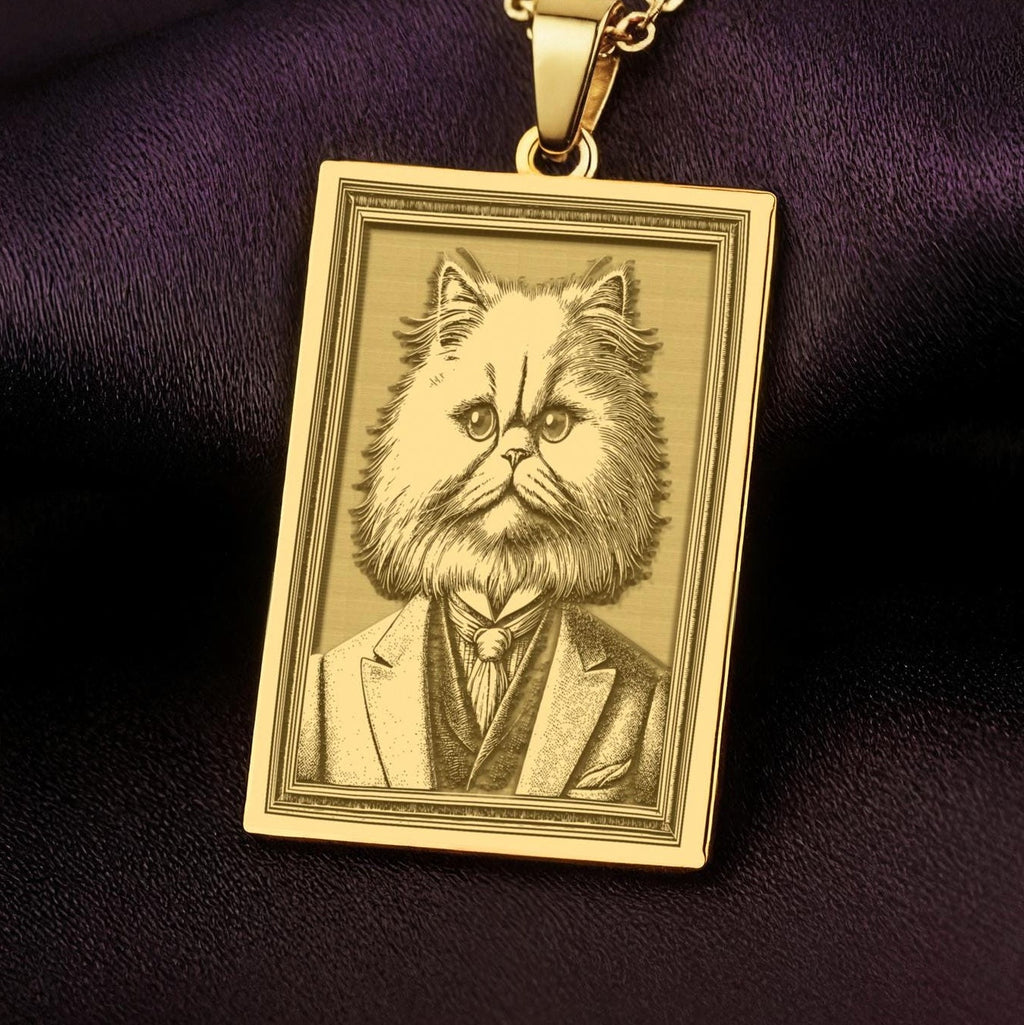 Product photo of a 14K Solid Gold Persian Cat necklace from the 'Victorian Pet Collection'. The engraved cat is portrayed as a distinguished gentleman with a noble expression.
