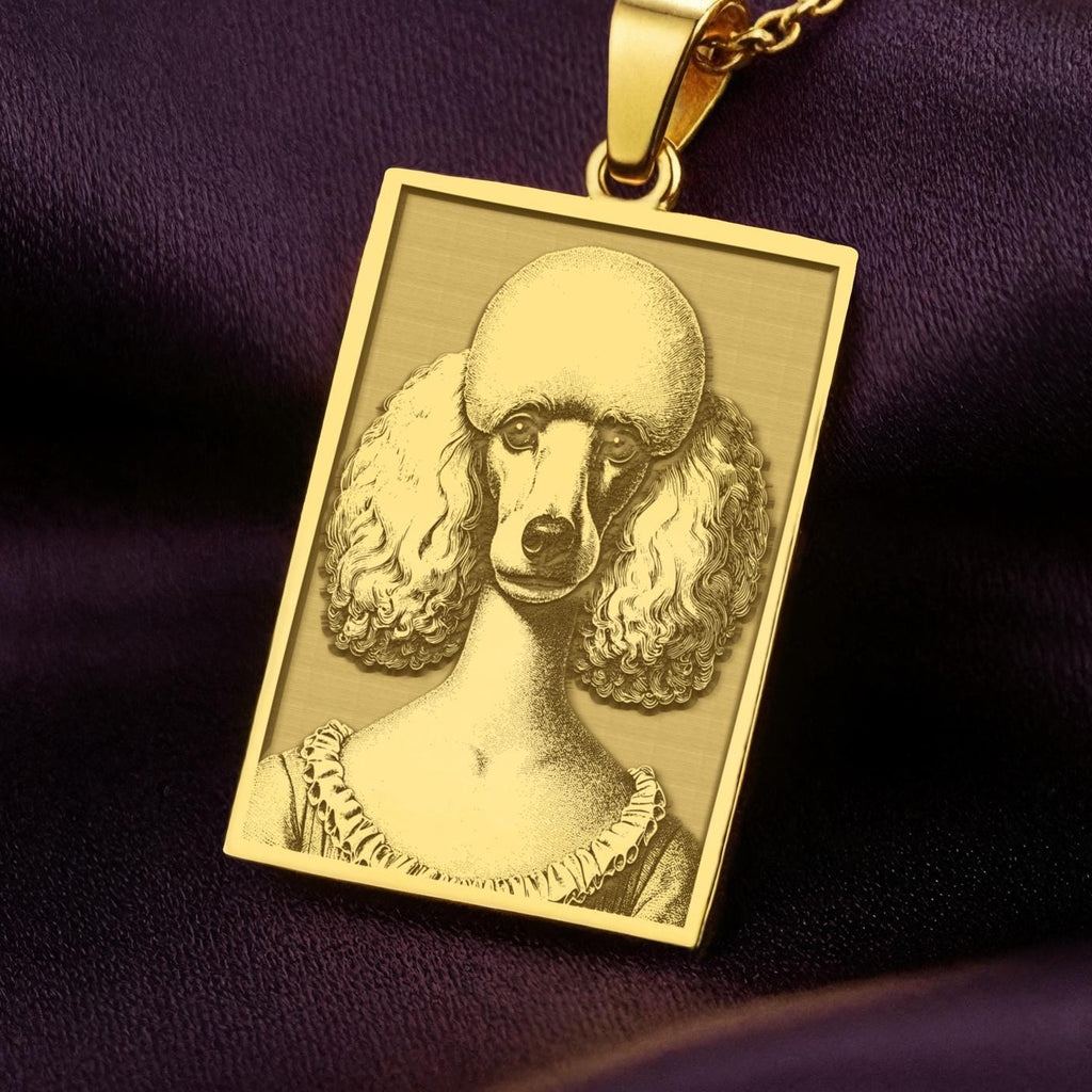 A rectangular 14K gold plated pendant necklace featuring a beautiful laser engraving of an elegant Poodle in a Victorian portrait style.