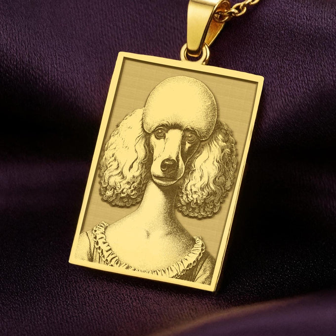 A rectangular 14K gold plated pendant necklace featuring a beautiful laser engraving of an elegant Poodle in a Victorian portrait style.