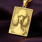 A rectangular 14K gold plated pendant necklace featuring a beautiful laser engraving of an elegant Poodle in a Victorian portrait style.