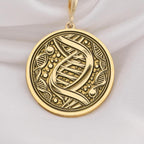 DNA Double Helix Science Pendant Necklaces 14K 14K Gold Plated pendant necklace featuring an abstract swirling line design on a round disc.