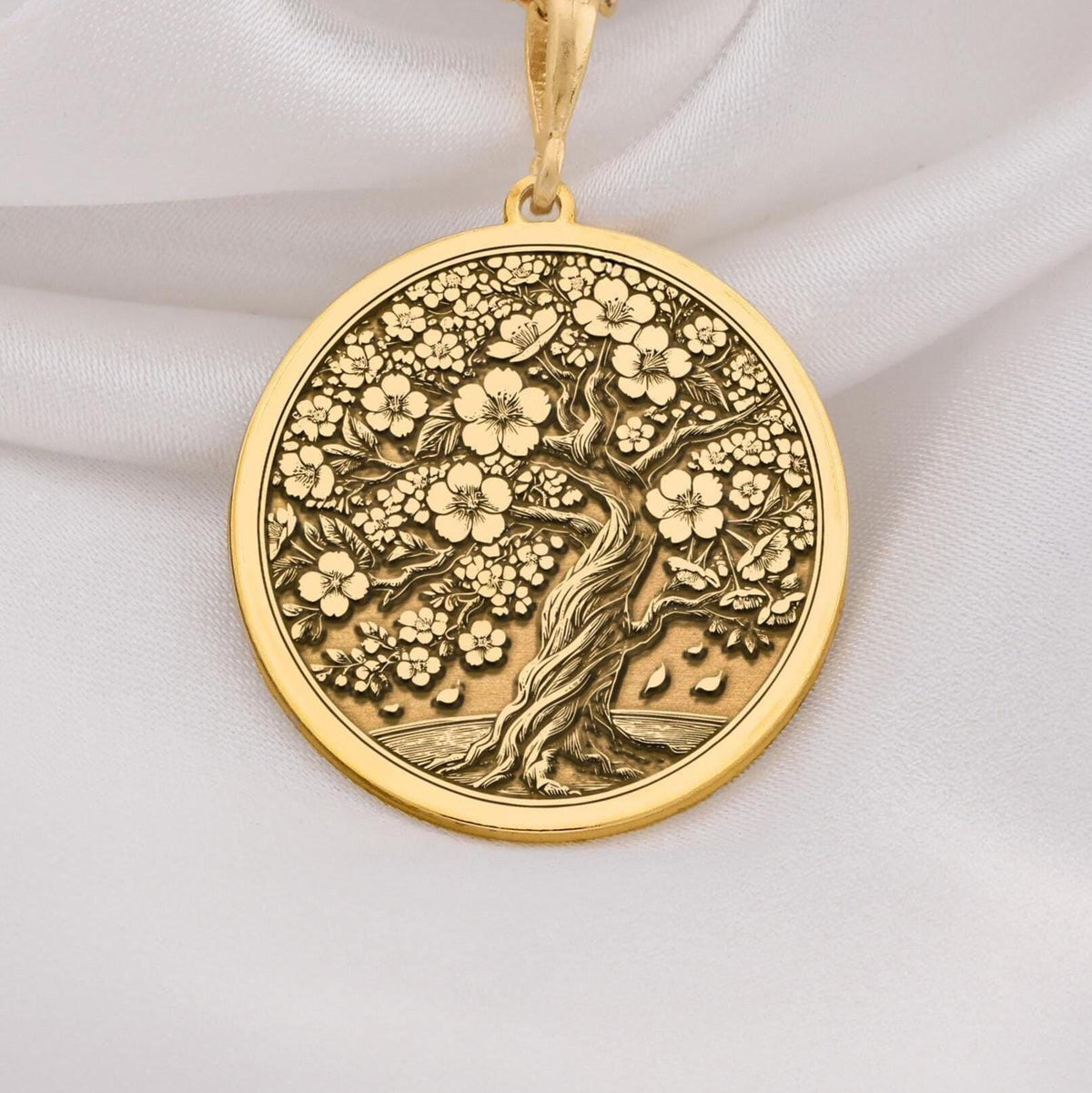 14K Gold Sakura Tree Pendant featuring a cherry blossom design, symbolizing renewal and beauty. Perfect for nature lovers and gift giving occasions.