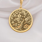 14K Gold Sakura Tree Pendant featuring a cherry blossom design, symbolizing renewal and beauty. Perfect for nature lovers and gift giving occasions.