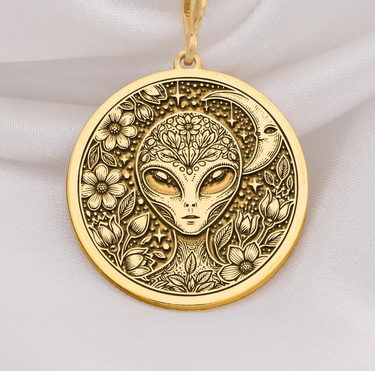 Mystical 14K gold alien pendant, featuring a detailed extraterrestrial medallion with floral cosmic engravings. A stunning sci-fi jewelry piece, perfect for space lovers, making it a unique gold cosmic charm.