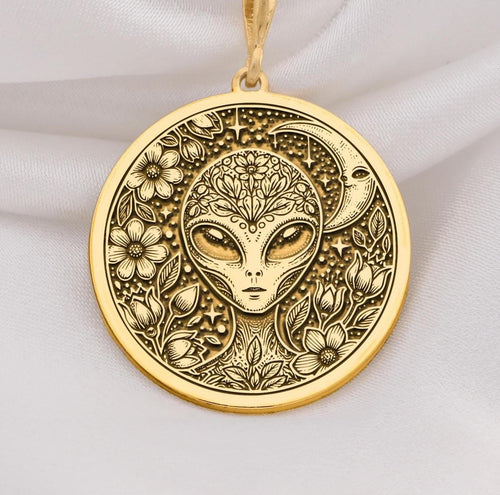 Mystical 14K gold alien pendant, featuring a detailed extraterrestrial medallion with floral cosmic engravings. A stunning sci-fi jewelry piece, perfect for space lovers, making it a unique gold cosmic charm.