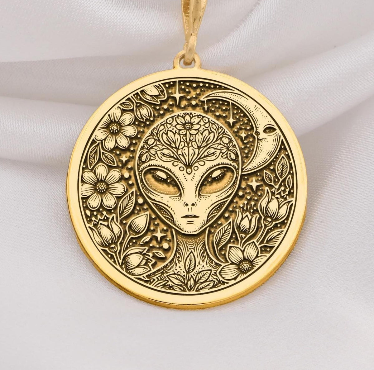 Mystical 14K gold alien pendant, featuring a detailed extraterrestrial medallion with floral cosmic engravings. A stunning sci-fi jewelry piece, perfect for space lovers, making it a unique gold cosmic charm.
