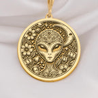 Mystical 14K gold alien pendant, featuring a detailed extraterrestrial medallion with floral cosmic engravings. A stunning sci-fi jewelry piece, perfect for space lovers, making it a unique gold cosmic charm.