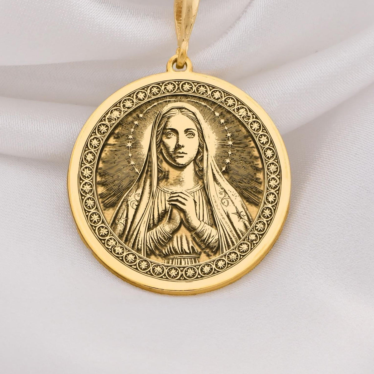 14K Solid Gold Queen of Peace necklace featuring Virgin Mary with halo and praying hands. A sacred and elegant Catholic gold medallion.