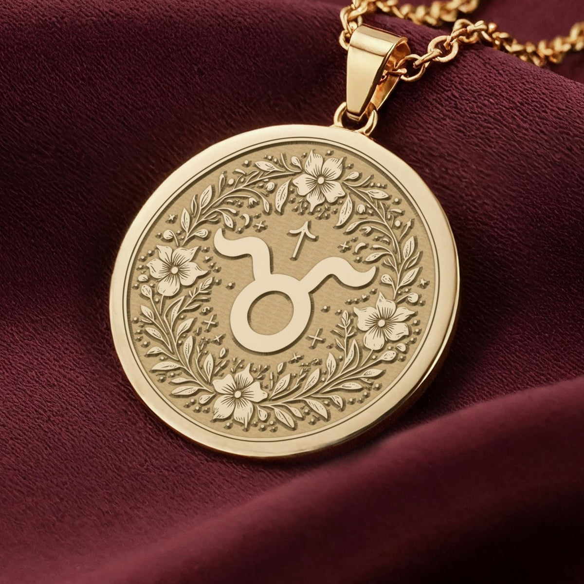 14K Solid Gold Taurus Zodiac Medallion with Taurus symbol (♉) and floral wreath. A perfect personalized gift with optional back engraving. Detailed celestial horoscope jewelry for astrology lovers.