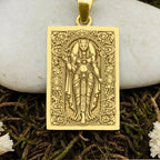 An heirloom-quality 14K solid gold tarot card amulet depicting the Goddess Bastet. This fine engraved jewelry is a sacred Kemetic paganism symbol.