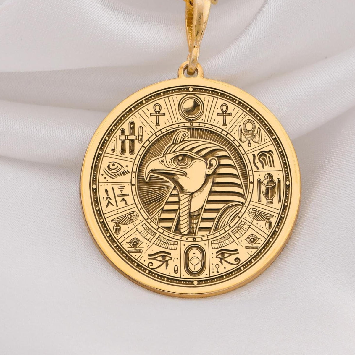 Eye of Horus Protection Amulet Necklace Necklaces 14K 14K Gold Plated pendant necklace featuring an intricate stylized bird head design with geometric patterns.