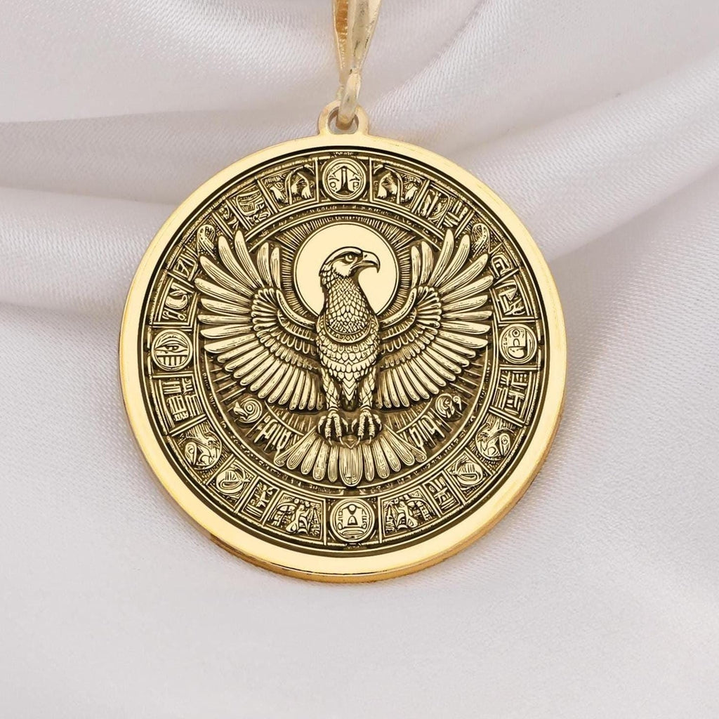 Horus Falcon Protection Pendant Necklaces 14K 14K Gold Plated pendant necklace featuring an eagle with wings design on a circular frame.